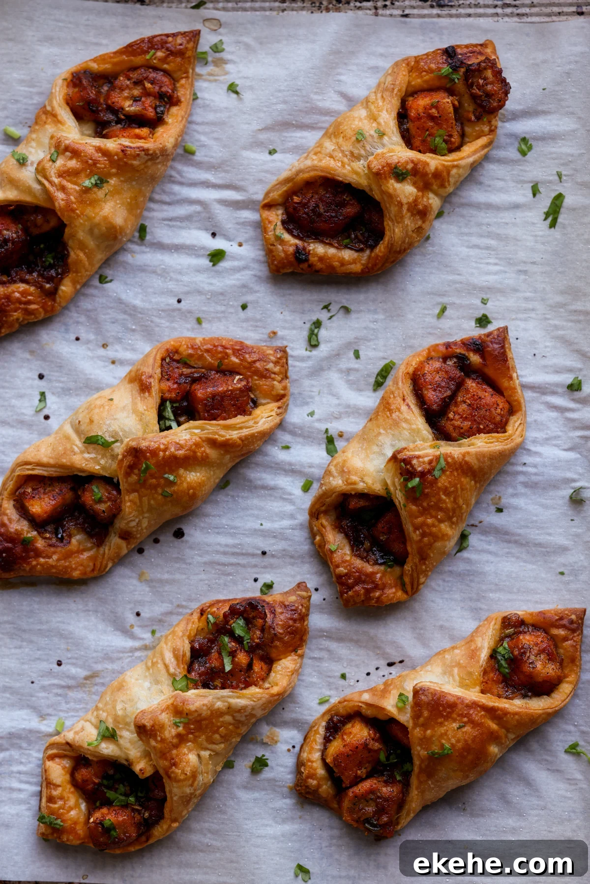 chilli garlic tofu puff pastries on the baking sheet