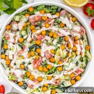 Tahini salad with dressing and half lemon