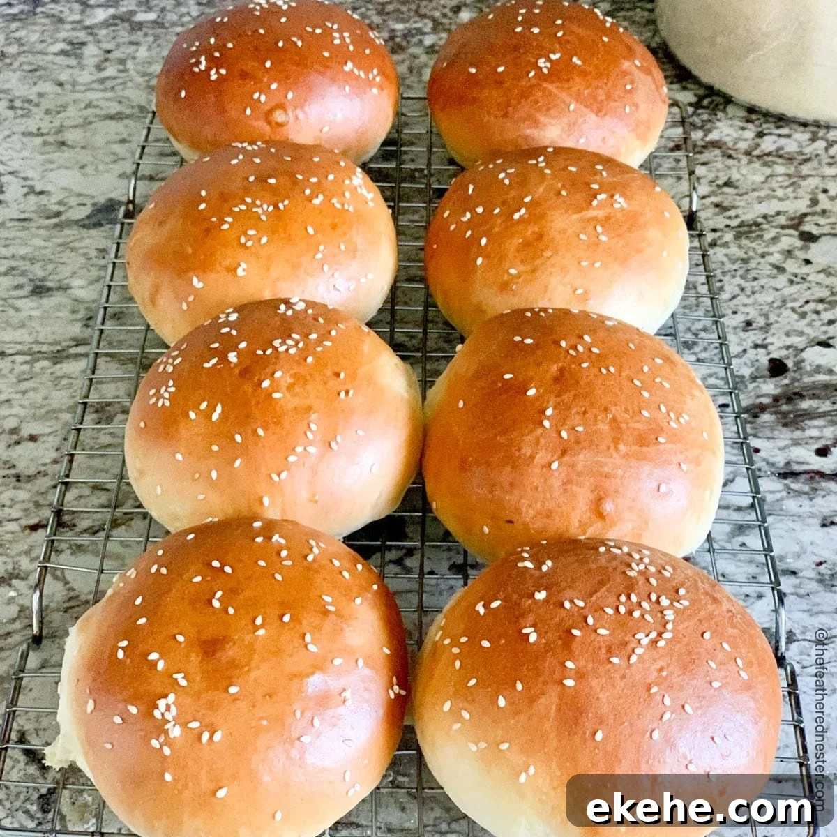 burger buns cooling on a cooling rack.