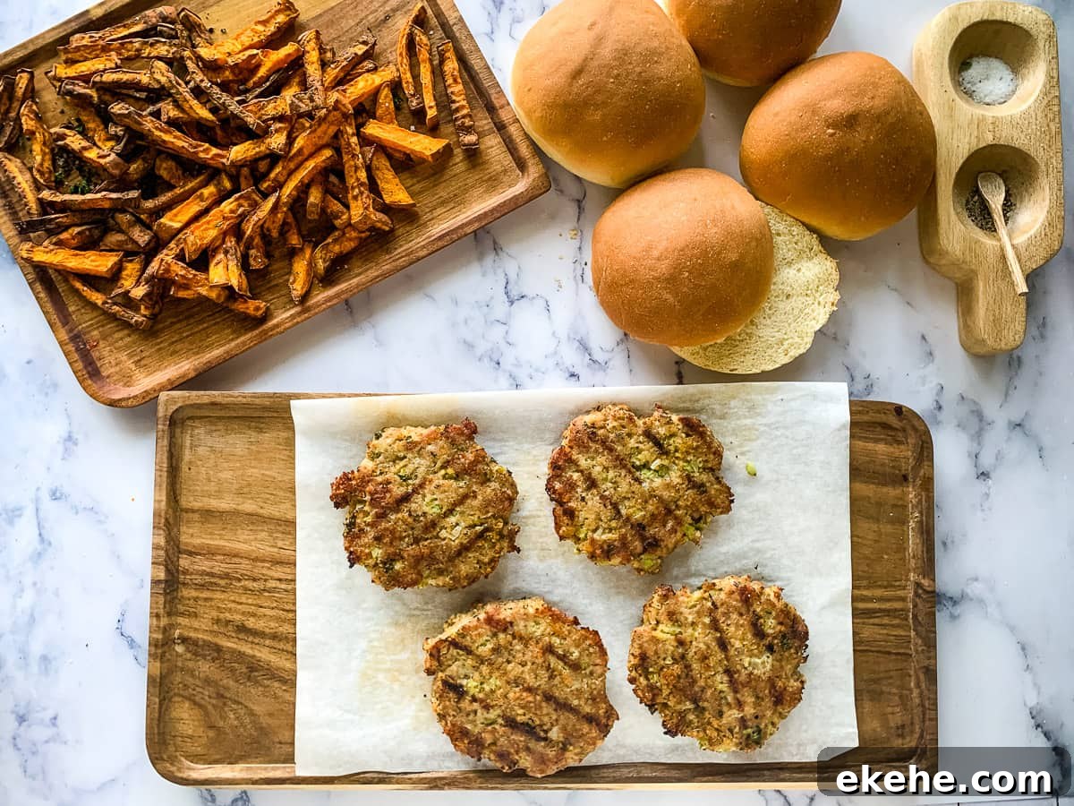 Turkey Burgers and buns with roasted sweet potato fries ready to serve.