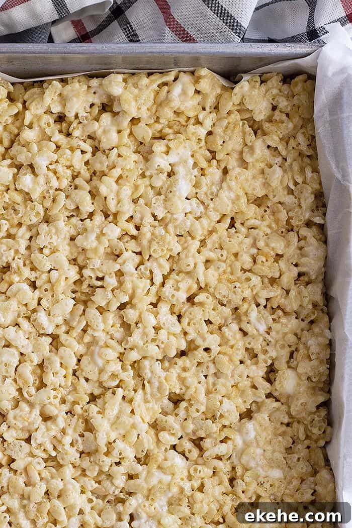 A pan of rice kirspie treats waiting to be cut into bars.