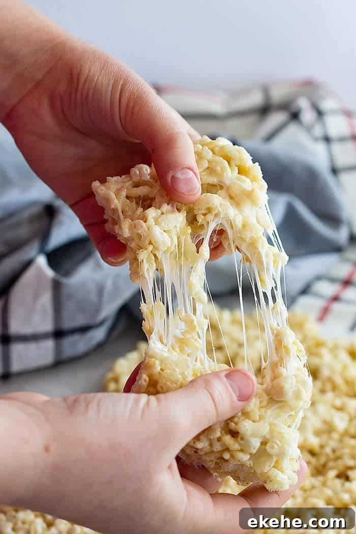 pulling apart a soft rice krispie treat