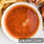 close up of a bowl of cajun butter sauce.