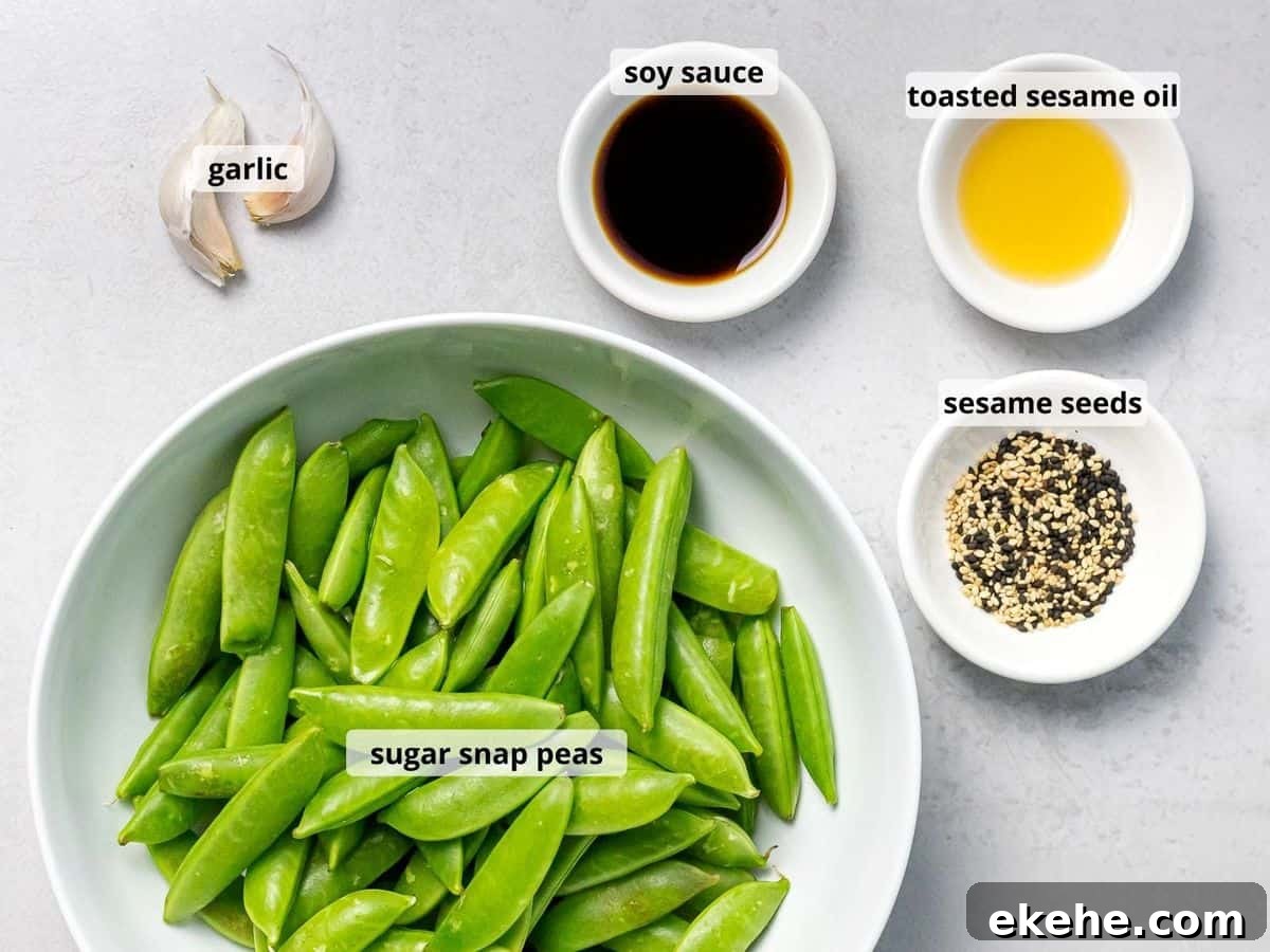 Labeled ingredients for stir fried sugar snap peas with text overlay, including sesame seeds, soy sauce, and sesame oil in small white bowls.