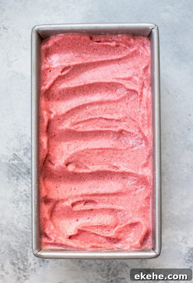 metal container with vegan strawberry ice cream