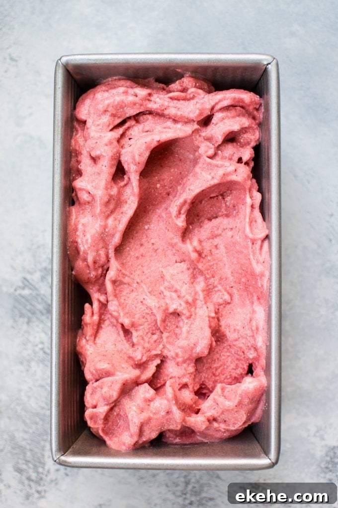 two ingredient vegan strawberry ice cream in a metal container