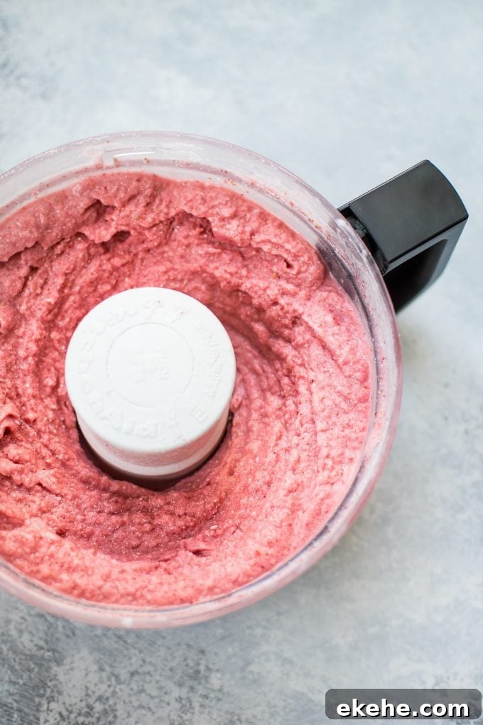 food processor with vegan strawberry ice cream