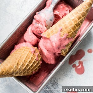 This 2-ingredient vegan strawberry ice cream is made with frozen strawberries, coconut milk, and your food processor in less than 10 minutes! 