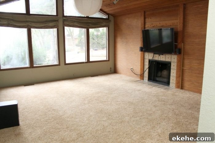 70's formal living room with dark walls and trim, and bamboo wallpaper