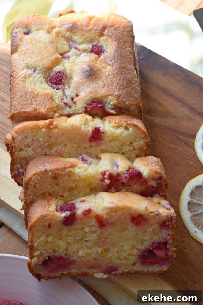 Raspberry and Blueberry Frozen Yogurt Popsicles for Summer Treats 7 a raspberry lemon loaf cake on a wooden board