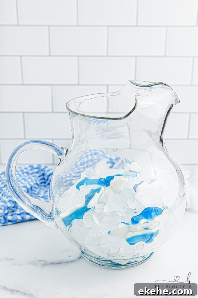Shark Attack Survival Punch: How to Defend Yourself in Water 5 Pitcher with ice and shark gummy candies