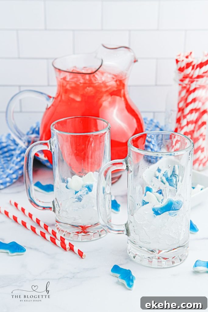 Shark Attack Survival Punch: How to Defend Yourself in Water 7 Shark gummies in a cup with ice