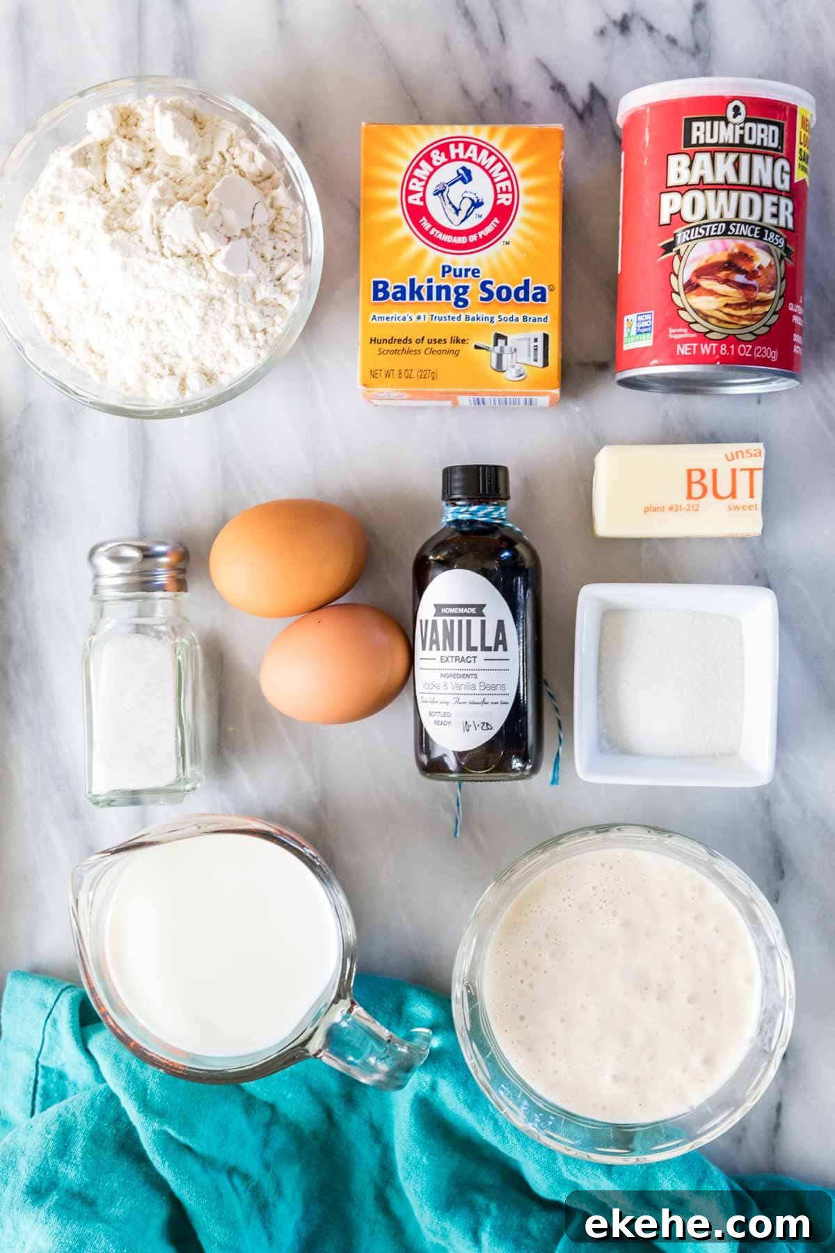 Fluffy Sourdough Pancakes Recipe for Crispy-Edge Breakfast 3 Overhead view of ingredients including flour, sourdough discard, eggs, and more.