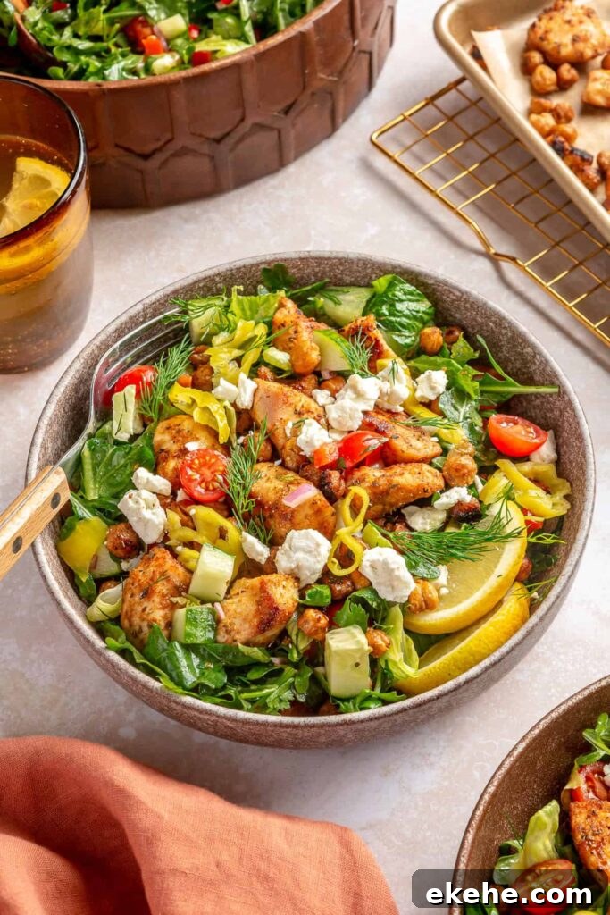 Mediterranean sheet pan chicken with crispy chickpeas and Greek salad ingredients