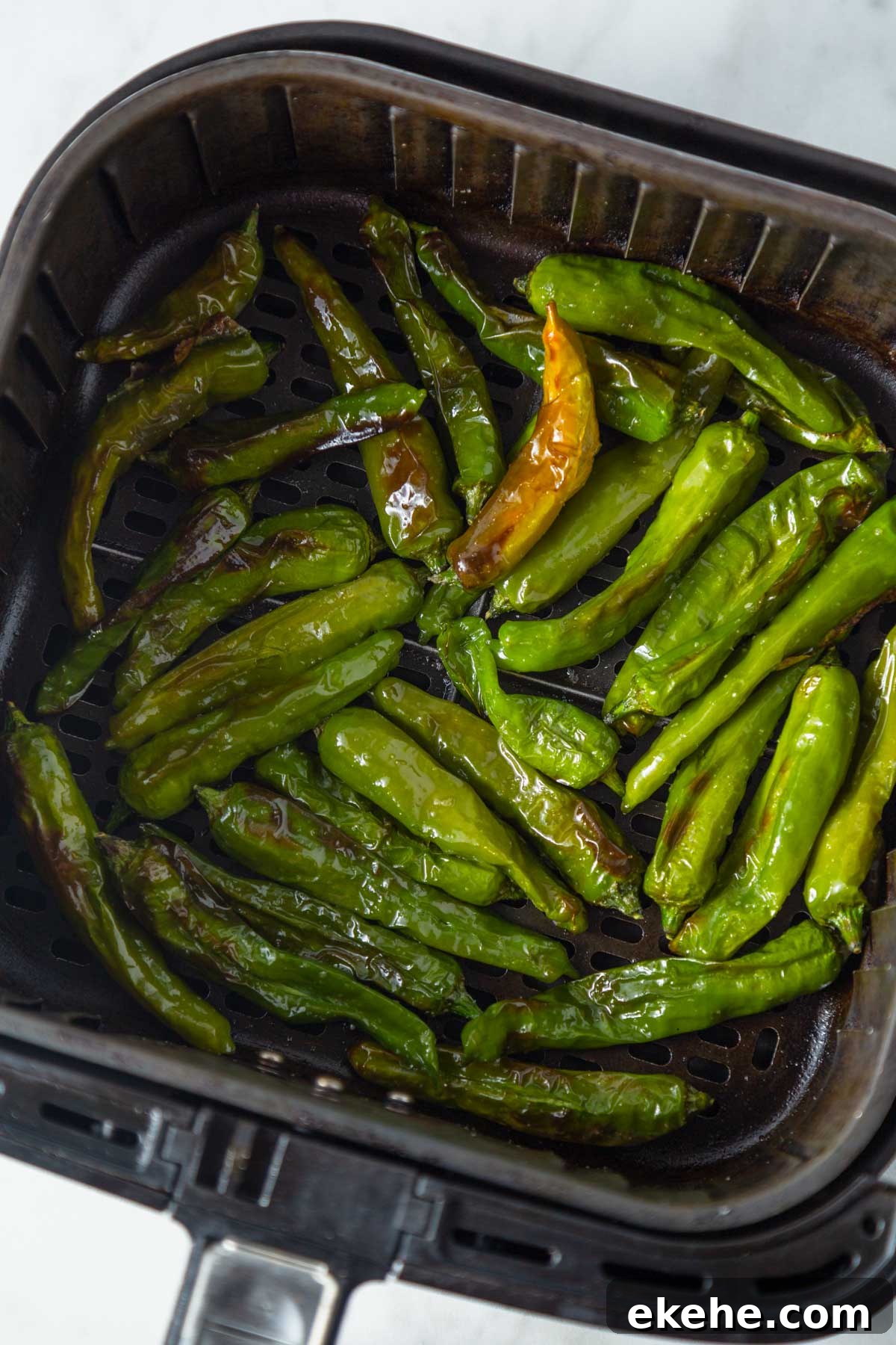 Air fryer blistered shishito peppers.