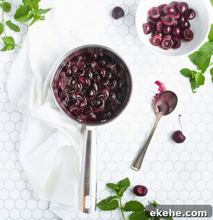 sauce pan with cooked cherry sauce